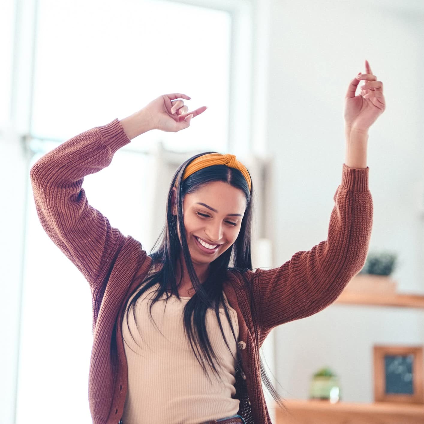 Teenager dances to loud music