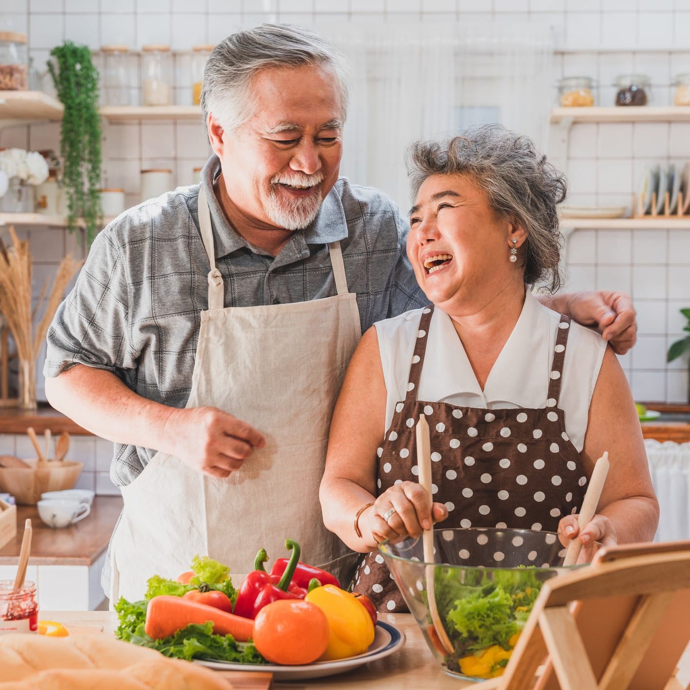 Happy couple preparing a holiday dinner.
