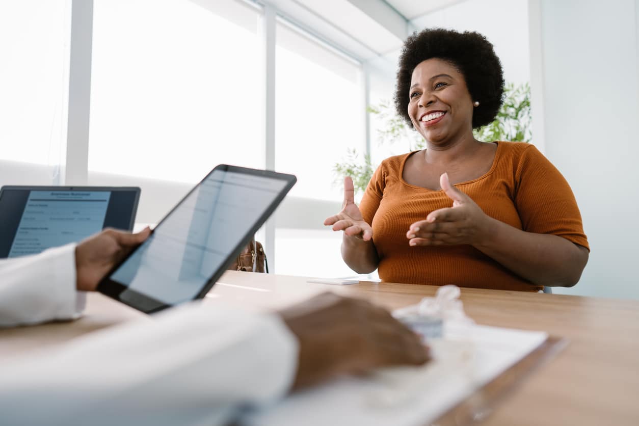 Smiling woman in a conference