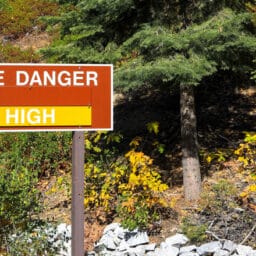 A sign in california warns residents of the high wildfire danger in summer